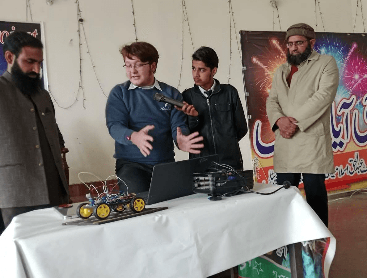 Mussab presenting and explaining a concept